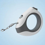 White and gray ring-shaped retractable pet leash with LED light for safe night walks and comfortable grip